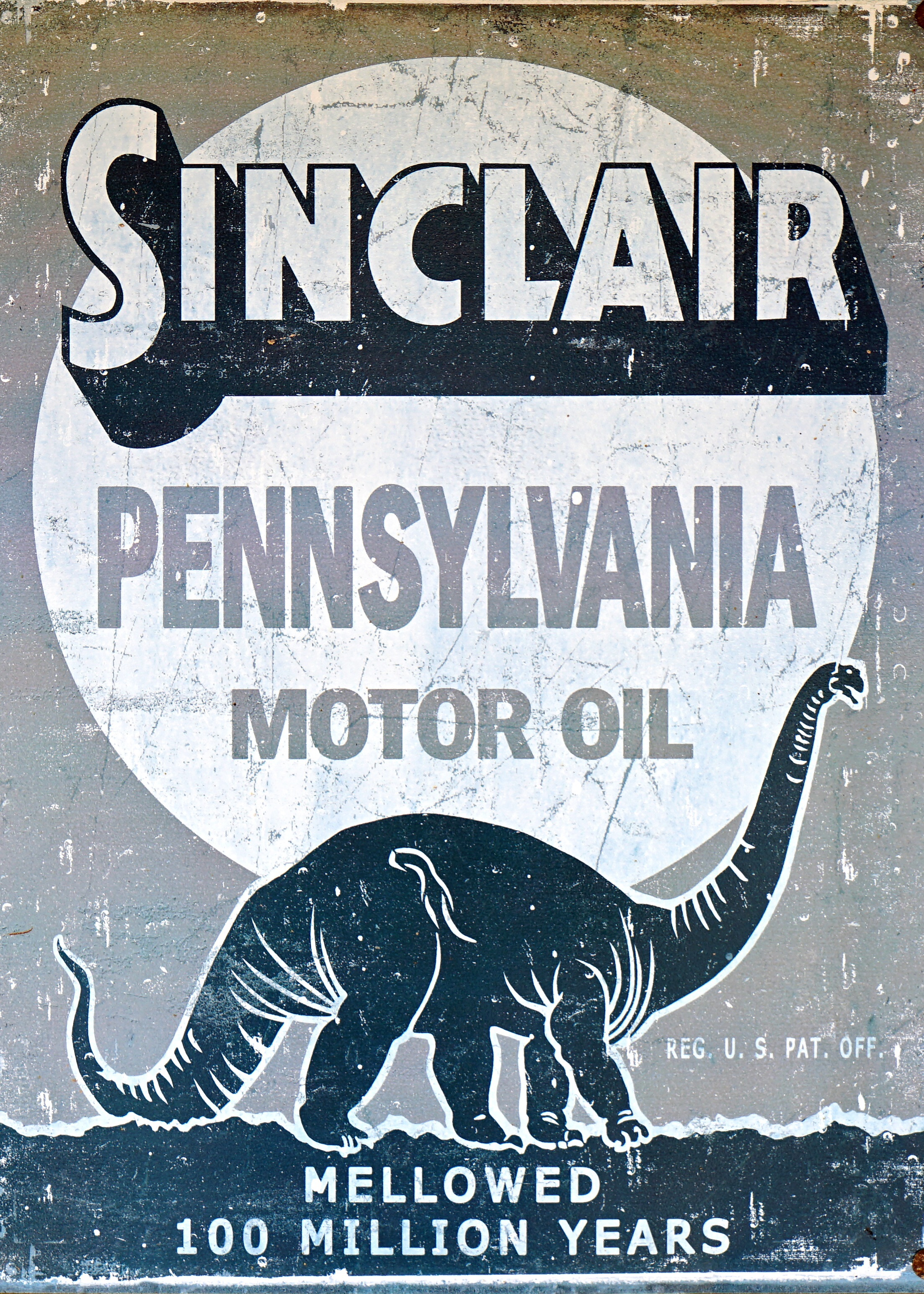 Ad sticker with a dynosaur