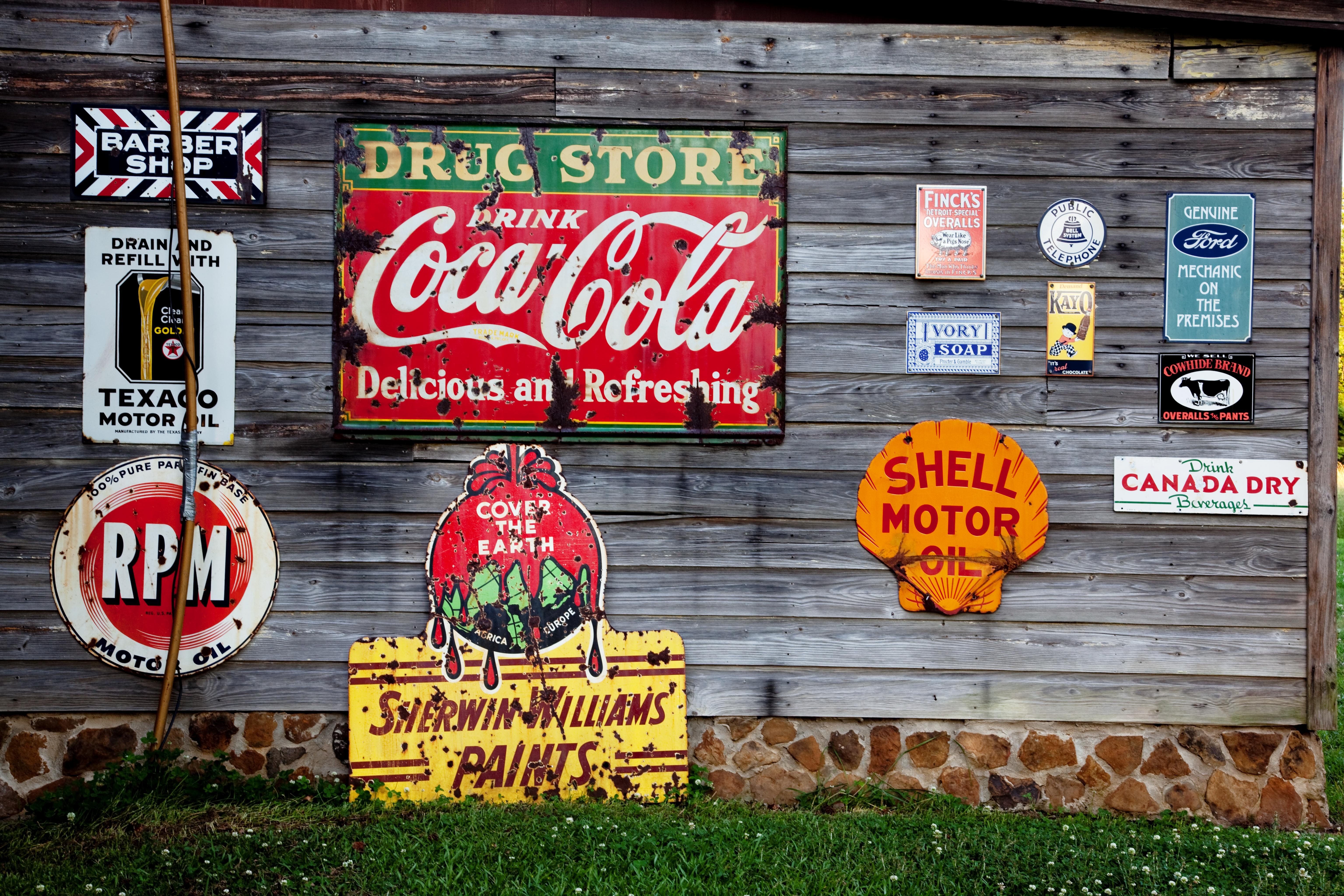 Signboards on a barnwall